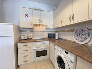 Apartment | Private kitchen | Highchair - Apartment in Nerja Near Burriana Beach (Nerja)