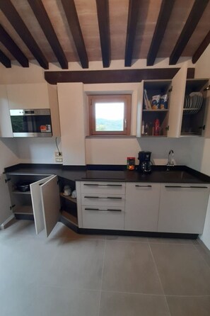 Fridge, microwave, cookware/dishes/utensils