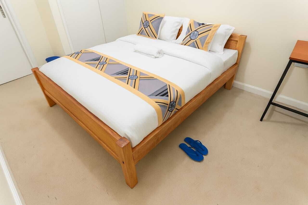 Desk, laptop workspace, blackout curtains, iron/ironing board