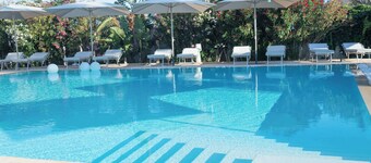 Boomerang Home 1 – Suite nel Boomerang Village Resort 4 Stelle – a soli 5 minuti da Punta Prosciutto