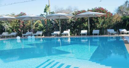 Boomerang Home 1 – Suite nel Boomerang Village Resort 4 Stelle – a soli 5 minuti da Punta Prosciutto