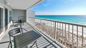 A balcony with a view of the beach and ocean. - Top Floor Beachfront - Great Views From Top Floor! Beach Service! (Fort Walton Beach)