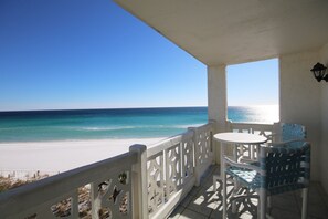 A balcony with a view of the beach and ocean. - 459 El Matador 2 Bedroom Condo (Fort Walton Beach)