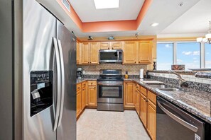 Fridge, microwave, oven, stovetop - Indies 401 | 3BR/3BA Corner Condo | Sleeps 6 | Wraparound Balcony & Views (Gulf Shores)