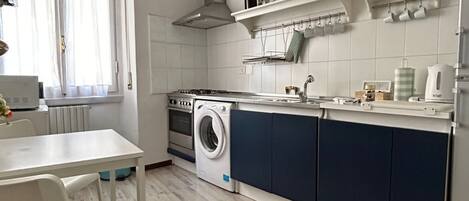 Fridge, microwave, cookware/dishes/utensils