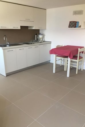 Fridge, cookware/dishes/utensils - Apartment  by Interhome (Brenzone)