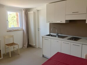 Fridge, cookware/dishes/utensils - Apartment  by Interhome (Brenzone)