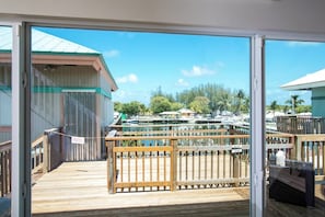 Unclassified image, 5 of 49, button - Waterfront Remodeled Home w/ Private 35’ Boat Dock  - at the foot of the iconic 7-Mile Bridge. Cozy house, water views, outdoor entertaining, private XL hot tub,  walk to Sunset Grill for pool. Perfect for fishing, boaters, divers & sunset lovers. (Marathon)