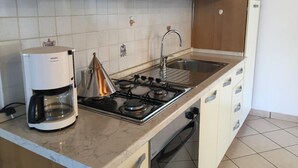 Luokittelematon kuva, 4 kautta 32, painike