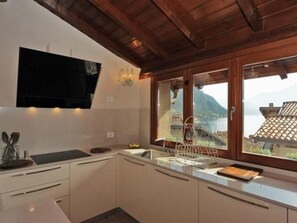 Fridge, microwave, dishwasher, cookware/dishes/utensils - 'La Casetta Limone by Interhome (Limone sul Garda)