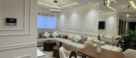 Appartement Deluxe, vue ville | Coin séjour