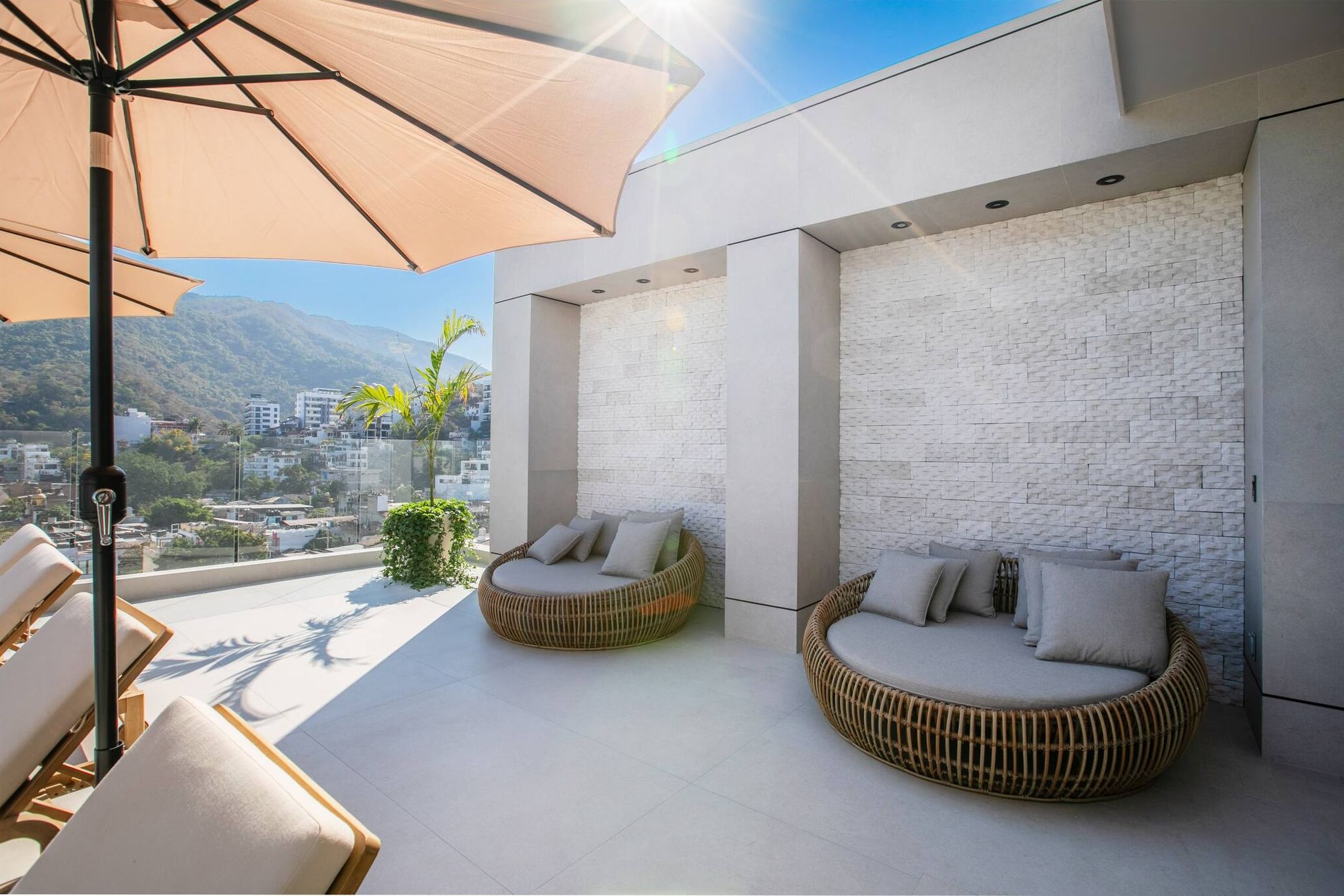 Multiple lounge seats on the terrace