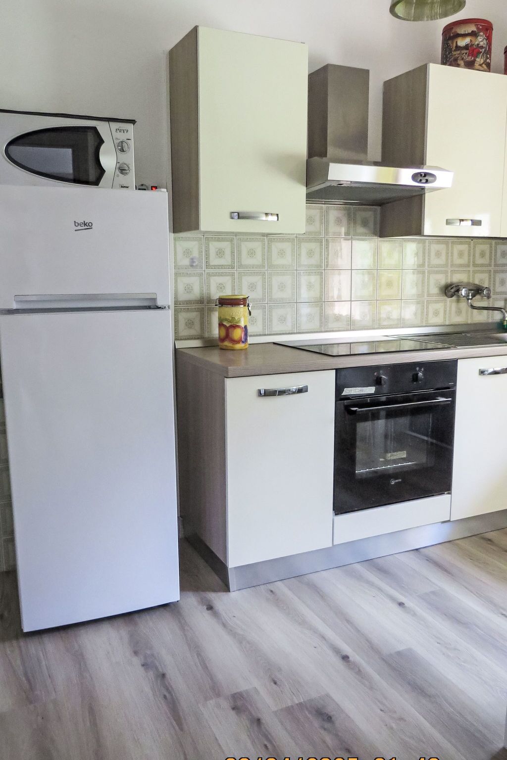 Fridge, microwave, cookware/dishes/utensils
