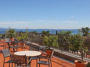 Outdoor dining - "San Rocco Suite mit Terrasse by Interhome (Manerba)