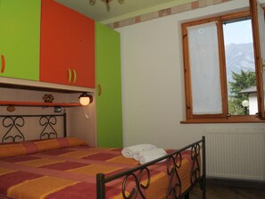 Bedroom - Erdgeschosswohnung mit privatem Garten by Interhome (Bezzecca)