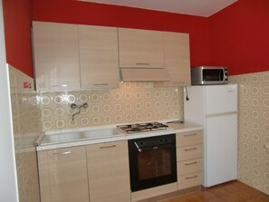 Kitchen / Dining Room - Erdgeschosswohnung mit Seeblick by Interhome (Bezzecca)