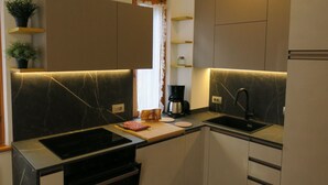 Fridge, microwave, oven, dishwasher - 2-stöckige Wohnung mit privatem Garten by Interhome (Bezzecca)