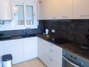 Fridge, microwave, dishwasher, cookware/dishes/utensils - A-239 Ferienwohnung, Meerblick, Roses by Interhome (Roses)