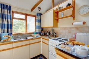 Microwave, oven, high chair, cookware/dishes/utensils