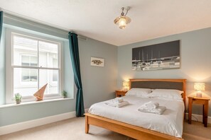 2 habitaciones, tabla de planchar con plancha y cuna de viaje 