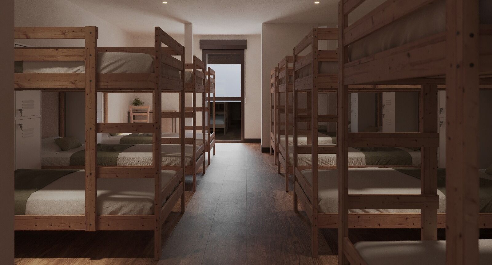 A room with bunk beds arranged in a row, a wooden floor, and a door leading to another room.