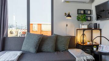 Mobile Home Confort, vue mer | Coin séjour