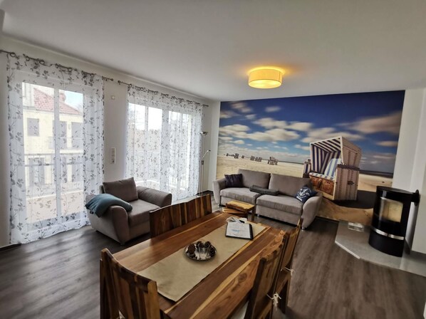 Living area - "Lotte Dree" vacation apartment: high-quality vacation apartment in the middle of the national park (Zingst-Müggenburg)