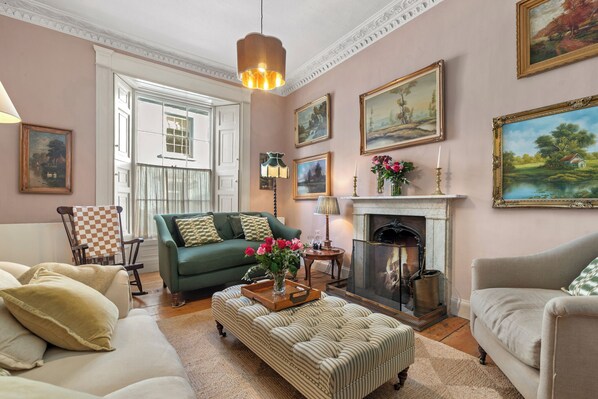 TV, fireplace, books