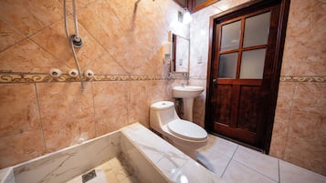 Basic Double Room | Bathroom | Shower, towels, soap, shampoo