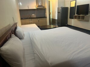 Egyptian cotton sheets, premium bedding, down duvets, memory-foam beds - Samriddhi Studio Apartment (New Delhi)