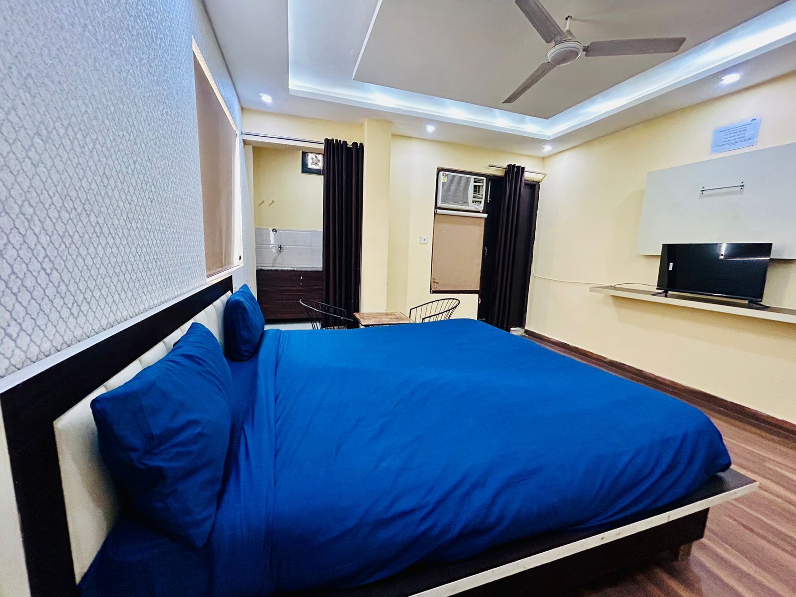 Deluxe Room, 1 King Bed, Kitchen | Egyptian cotton sheets, premium bedding, down duvets, memory-foam beds