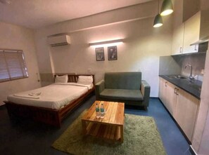 Deluxe Room, 1 King Bed, Kitchen | Egyptian cotton sheets, premium bedding, down comforters - Samriddhi Studio Apartment (New Delhi)