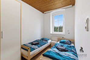2 dormitorios y ropa de cama