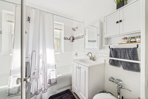 Hair dryer, towels, soap, shampoo