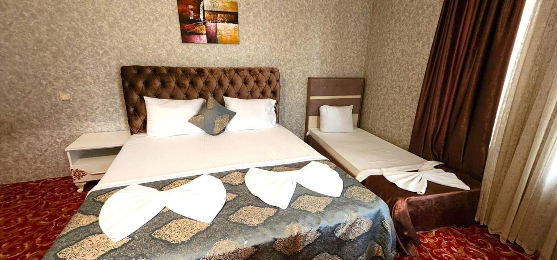 Premium bedding, desk, laptop workspace, free WiFi