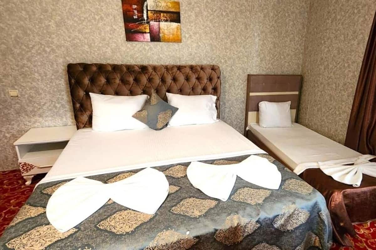 Premium bedding, desk, laptop workspace, free WiFi
