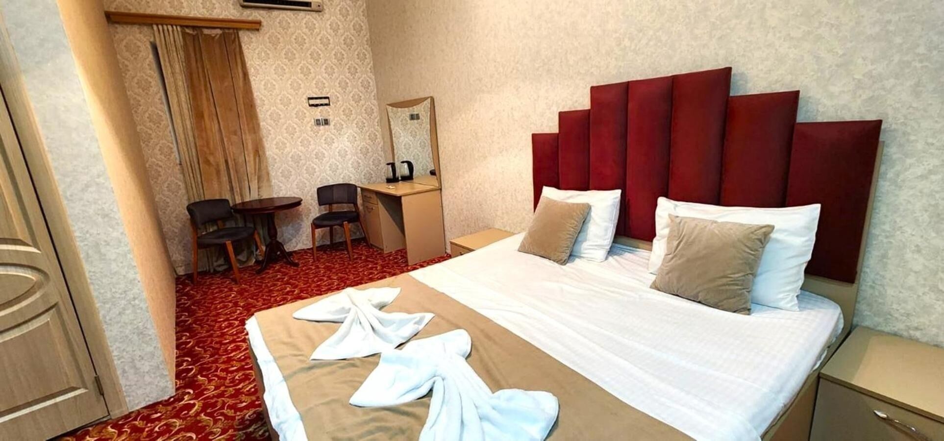 Premium bedding, desk, laptop workspace, free WiFi