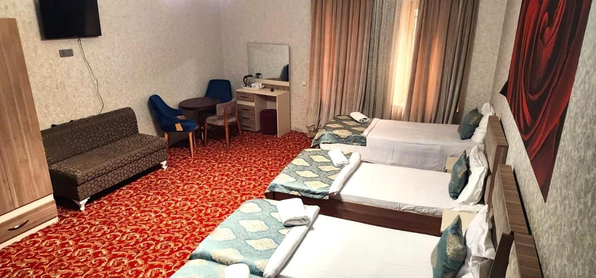 Premium bedding, desk, laptop workspace, free WiFi