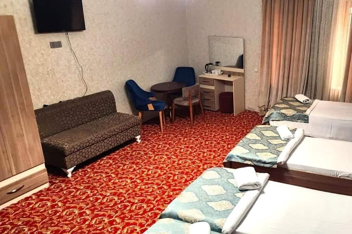 Premium bedding, desk, laptop workspace, free WiFi