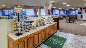A buffet area with a variety of food items and a sign promoting Cheerios. -  Scenic View Inn - Lake Powell - Page AZ (Page)