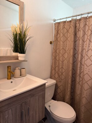 Bathroom - Enjoy a cozy and modern, renovated Cozy Boho Apt Near Ojo de Agua in Vega Baja. (Vega Baja)