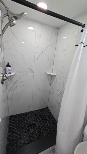 Shower, towels, soap, shampoo