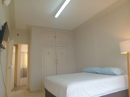 Suíte conforto, vista para a cidade | Wi-Fi de cortesia. Capsula Residence Hotel