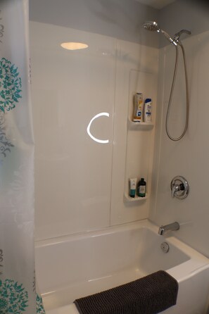 Hair dryer, towels, soap, shampoo