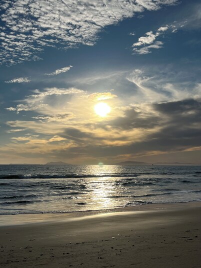 Welcome to the Seaside Serenity! This 2/2 condo is steps from the sand!