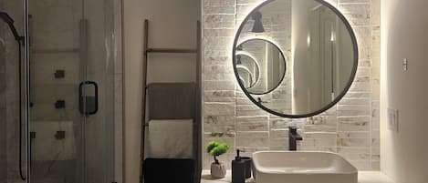 Shower, hair dryer, towels, soap