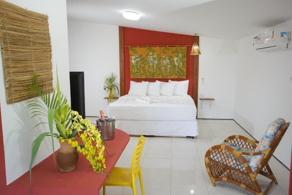 Deluxe-suite - balkon - udsigt til pool | Pengeskab på værelset, skrivebord, arbejdsområde til bærbare computere