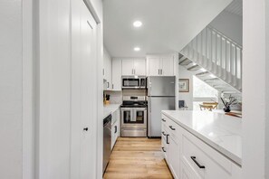 Microwave, oven, stovetop, dishwasher - Beautifully Renovated 2-bedroom condo with AC, sleeps 6, North Shore Oahu (Kahuku)