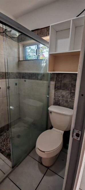Shower, eco-friendly toiletries, hair dryer, towels