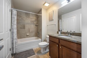 Hair dryer, towels, soap, shampoo